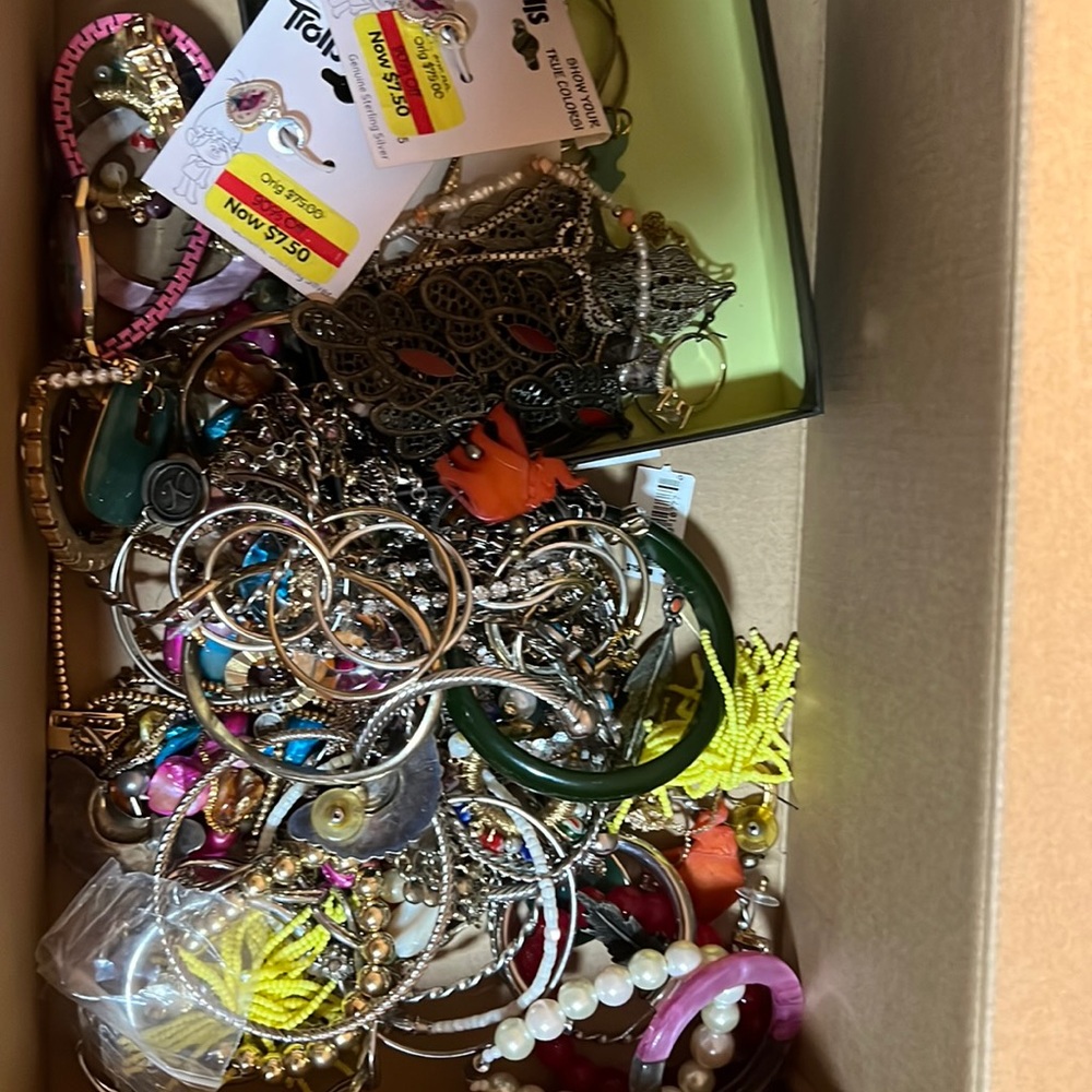 Lot of jewelry, bracelets rings earrings necklaces charms watch.